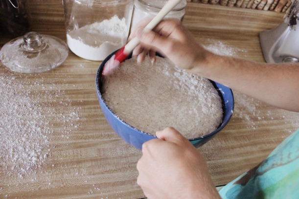 Using a spatula, work your way around the outside of the dough to separate from the side of the bowl